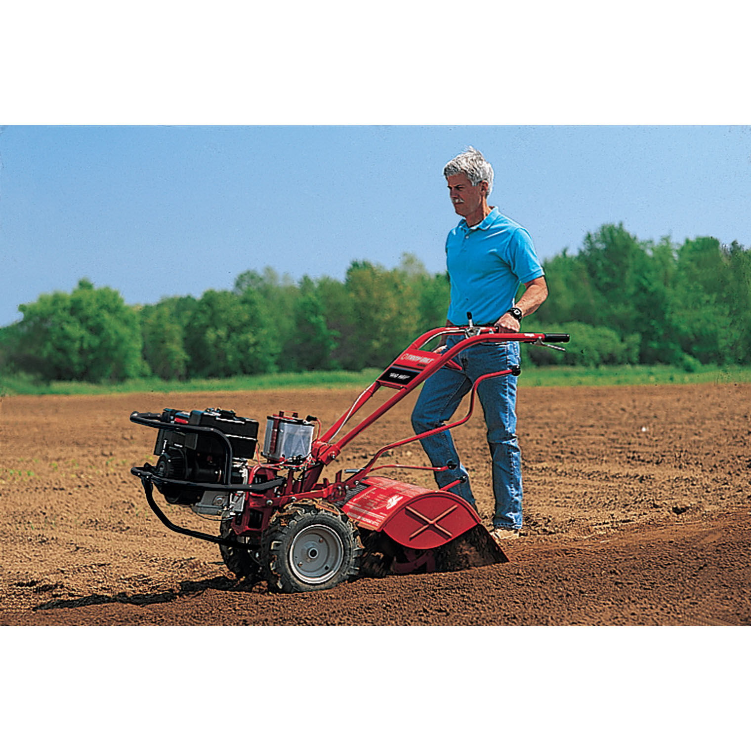 Lawn mower clearance tiller