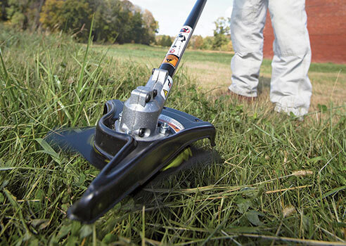 TrimmerPlus Attachment trimming the grass